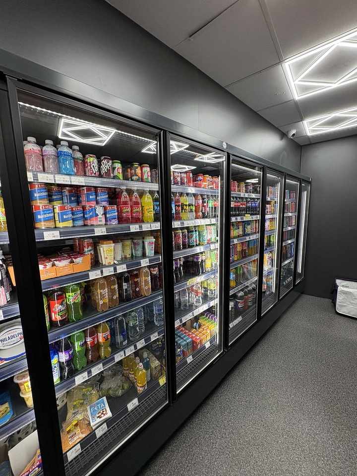Chilled soft drinks, water, juice and milk drinks in the refrigerators at C&K Local Store.