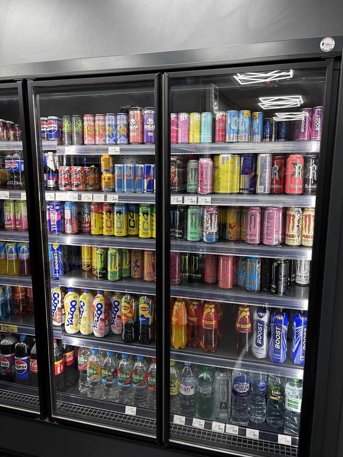 Energy drinks, sports drinks and bottled water chilled at C&K Local Store.
